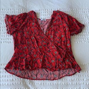 red patterned faux wrap top